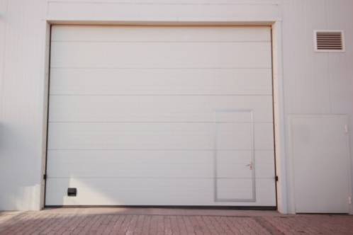 Cómo elegir los paneles correctos para reemplazar una puerta de garaje